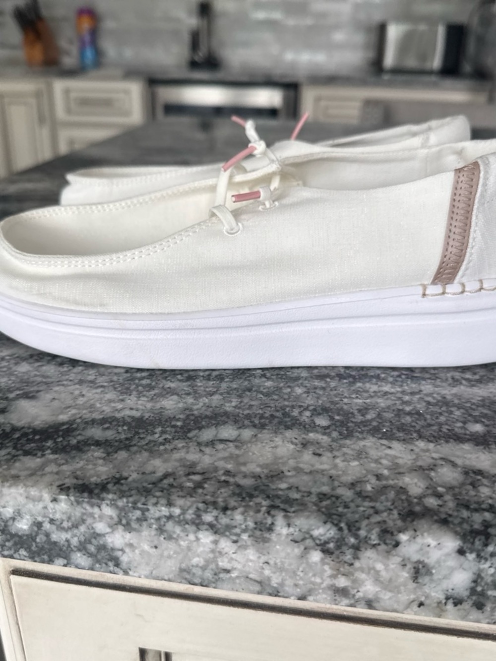 Hey dude women’s White Canvas Slip-On Shoes with tan Accent